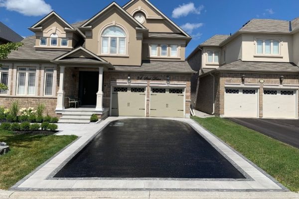 Single-house-two-garage-asphalt-sealing-driveway