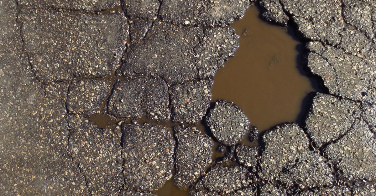 Asphalt potholes featured