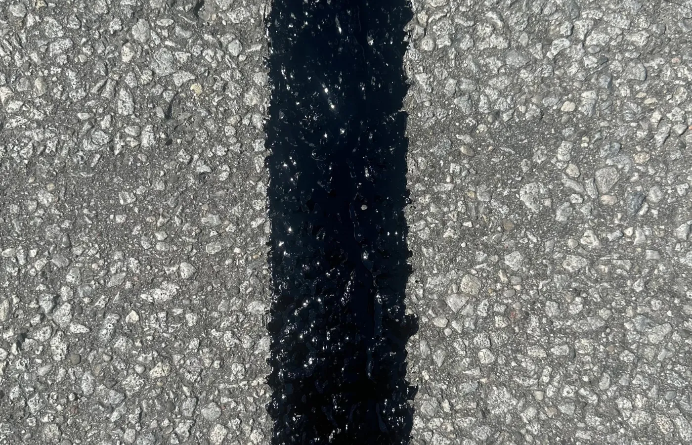 applying asphalt crack filler step by step