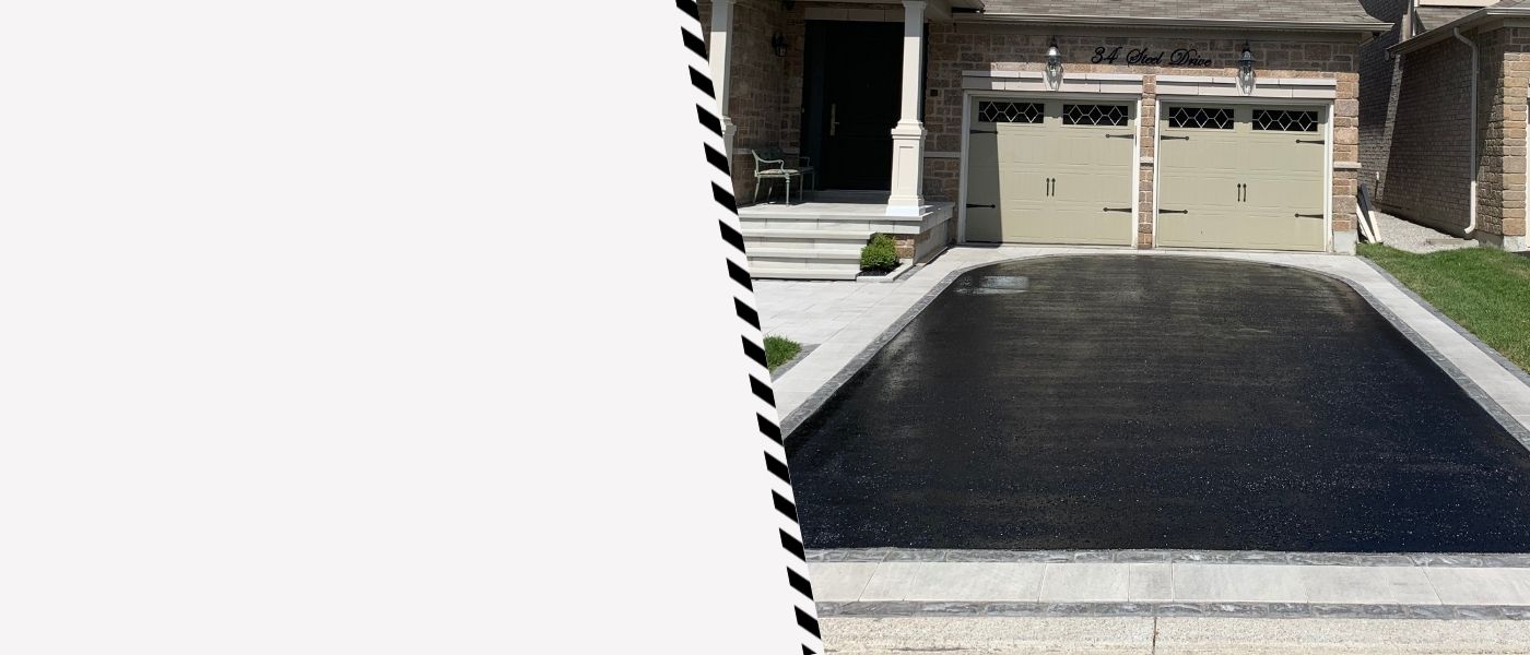 Image depicts a driveway that has been sealed as part of a driveway sealing Caledon project.