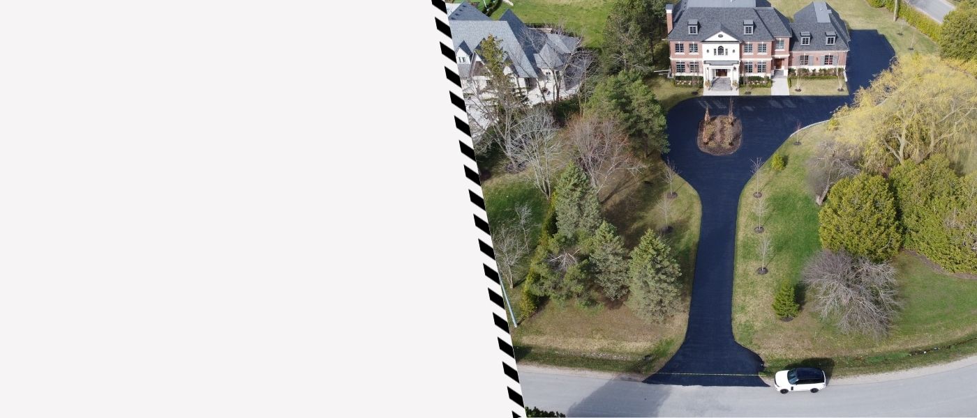 Image depicts a driveway that has been sealed as part of a driveway sealing East York project.