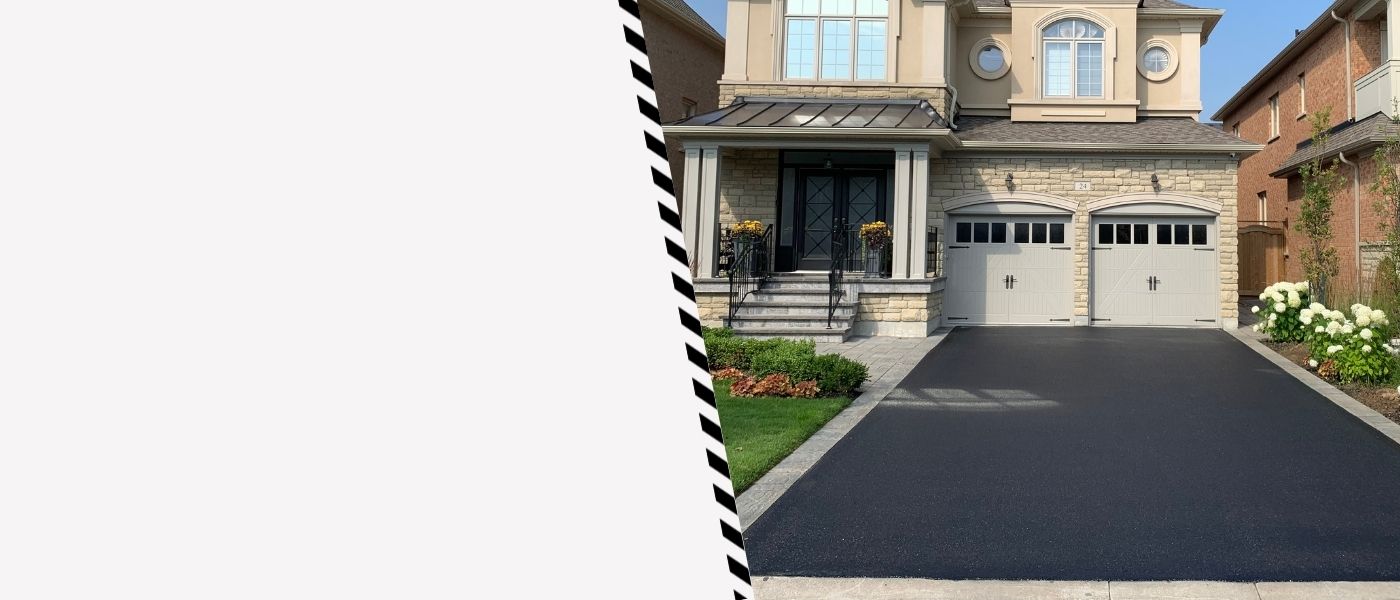 Image depicts a driveway that has been sealed as part of a driveway sealing Kleinburg project.