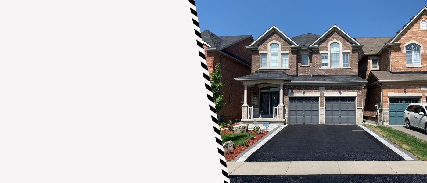 Image depicts a driveway that has been sealed as part of a driveway sealing Markham project.