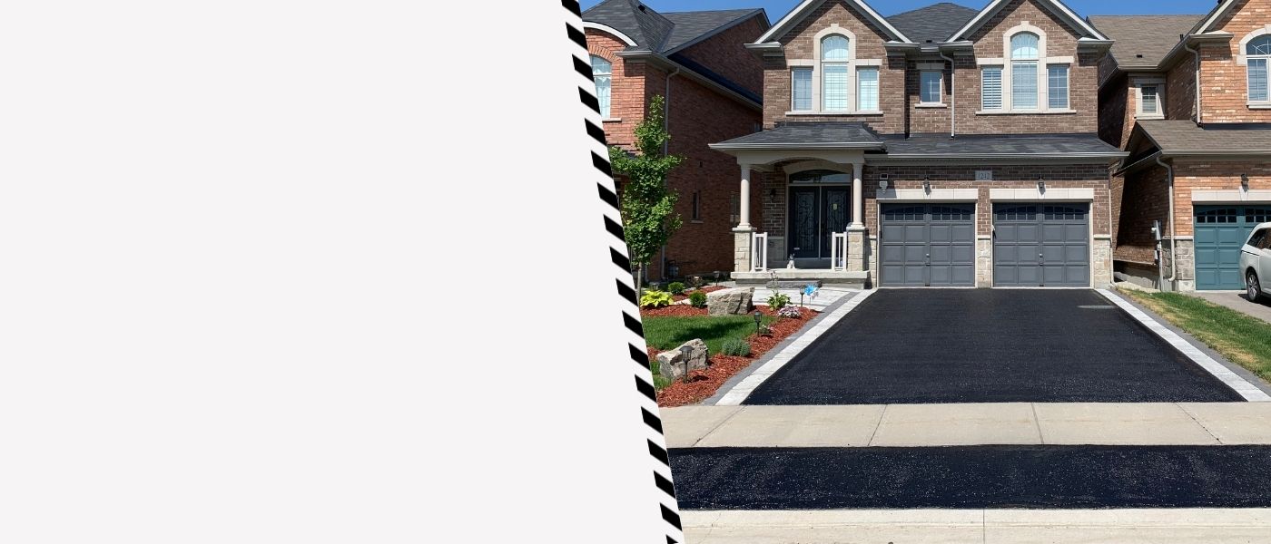 Image depicts a driveway that has been sealed as part of a driveway sealing Pickering project.