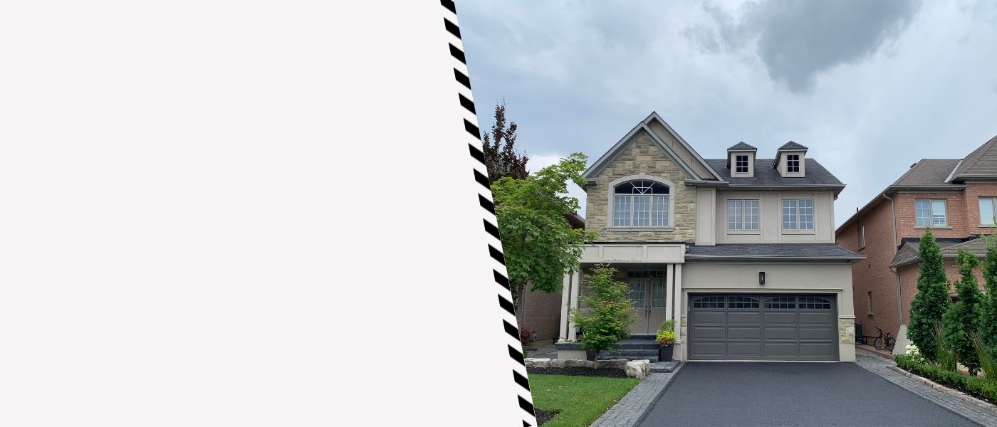 Image depicts a driveway that has been sealed as part of a driveway sealing Scarborough project.