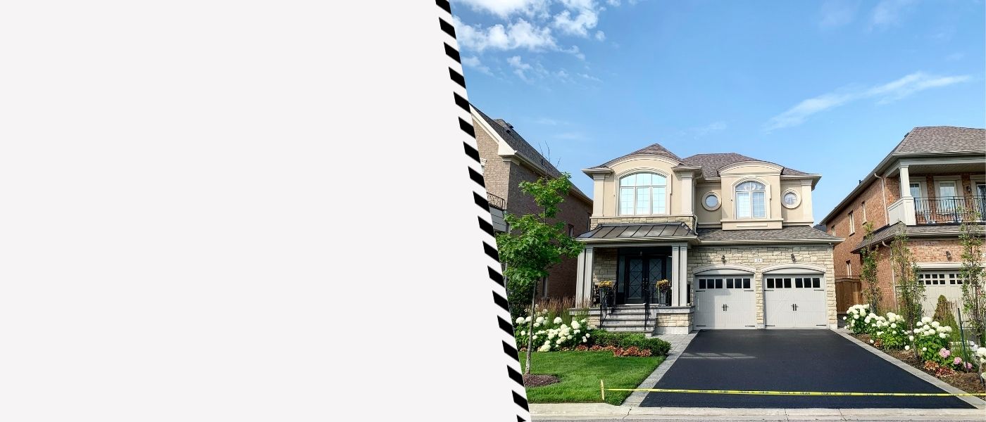 Image depicts a driveway that has been sealed as part of a driveway sealing Thornhill project.