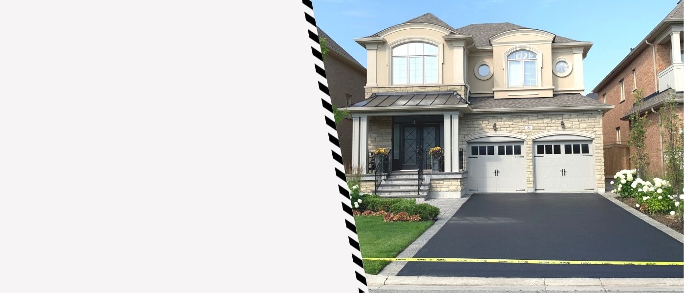 Image depicts a driveway that has been sealed as part of a driveway sealing Unionville project.