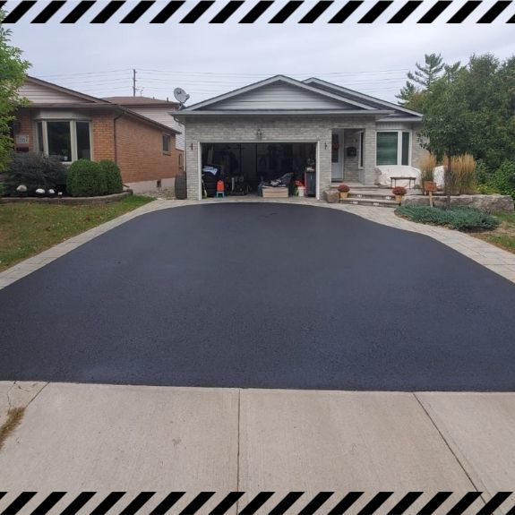 Image depicts a driveway that has been sealed as part of a driveway sealing East York project.