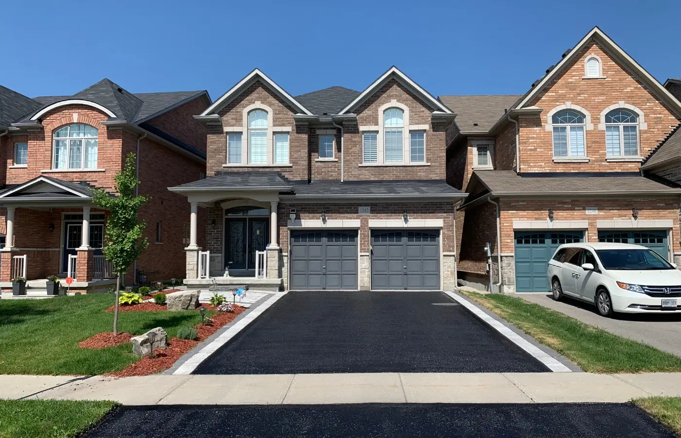 install asphalt vs concrete driveways